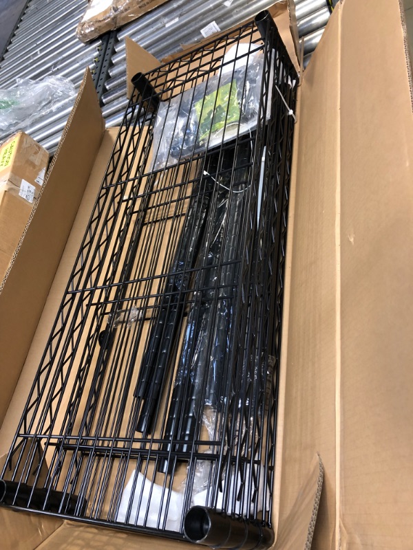 Photo 5 of Amazon Basics 4-Shelf Adjustable, Heavy Duty Storage Shelving Unit (350 lbs loading capacity per shelf), Steel Organizer Wire Rack, Black (36L x 14W x 54H) Black 4-Shelf Storage Unit without Caster