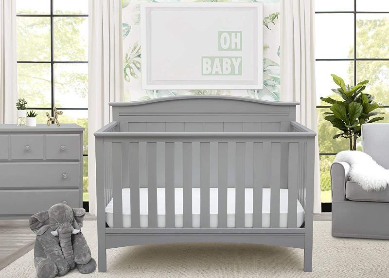 Photo 1 of Delta Children Bennett 4-in-1 Convertible Baby Crib, Grey + Serta Perfect Slumber Dual Sided Recycled Fiber Core Crib and Toddler Mattress (Bundle) Grey Crib 