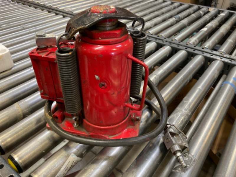 Photo 1 of BIG RED TA92006 Torin Pneumatic Air Hydraulic Bottle Jack with Manual Hand Pump, 20 Ton (40,000 lb) Capacity, Red 20 Ton (40,000 LBs) Pneumatic Air Jack