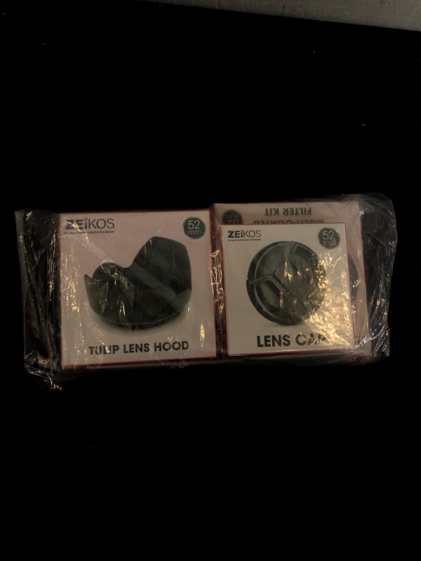 Photo 1 of Zeikos 52MM Multi-Coated UV-CPL-FLD Professional Lens Filter Kit, Tulip Flower Lens Hood, Lens Cap and Lens Cap Keeper with Pouch and Miracle Fiber Microfiber Cloth