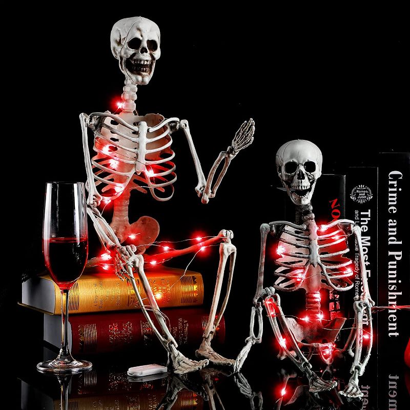 Photo 1 of 2 Pcs 28" 24" Halloween Skeleton with 2 LED String Lights Couple Realistic Full Body Halloween Skeleton Decoration with Movable Posable Joints Bones Human Bones Body Prop for House Graveyard Decor()
