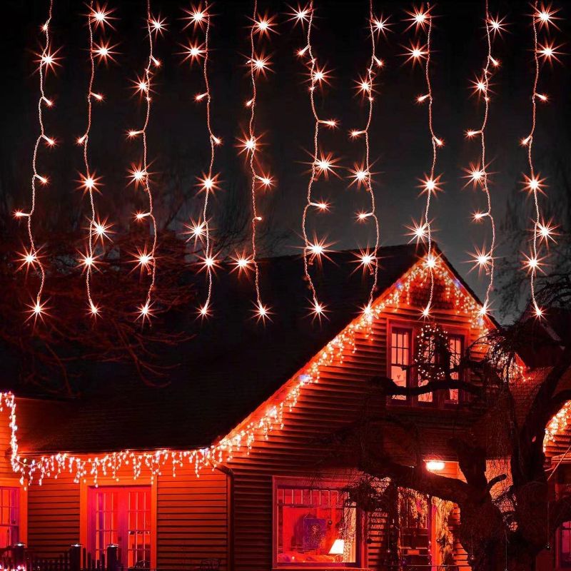 Photo 1 of kemooie Outdoor Christmas Lights, 400 LEDs 26.2FTx 3.3FT Orange Curtain Lights, 8 Lighting Modes Halloween Christmas Decorations for Wall Party Garden ( Orange)
