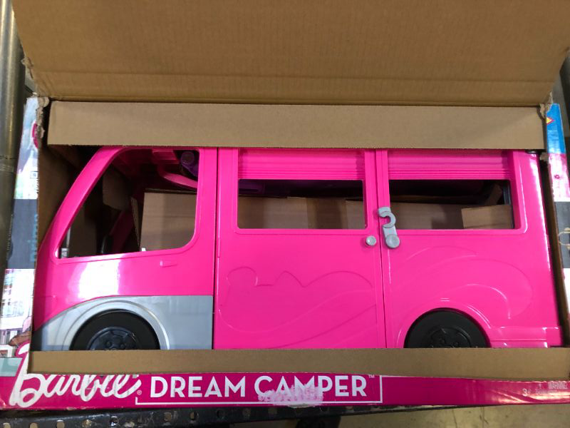 Photo 2 of Barbie Camper, DreamCamper Toy Playset with 60+ Barbie Accessories and Furniture Pieces, 7 Play Areas Including Pool and Slide