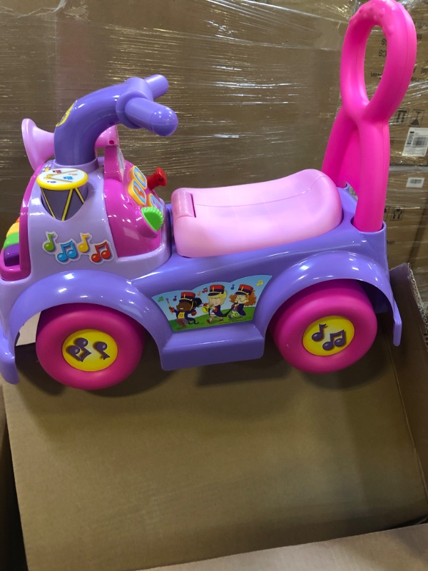 Photo 3 of Fisher Price Music Parade Purple Ride-On with 5 Different Marching Tunes! [Amazon Exclusive]