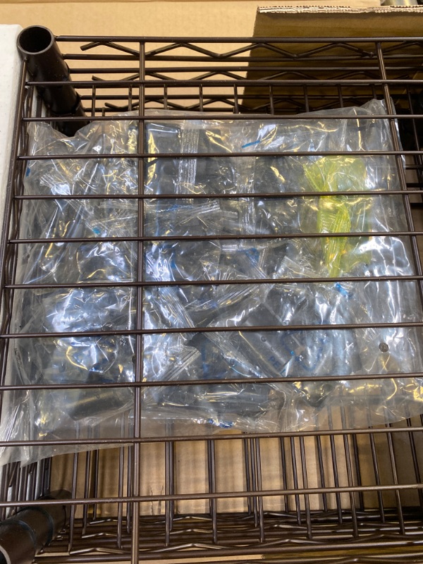 Photo 5 of Amazon Basics Expandable Metal Hanging Storage Organizer Rack Wardrobe with Shelves, 14"-63" x 58"-72", Bronze Bronze Organizer