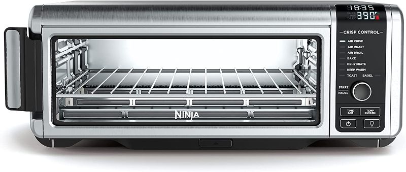 Photo 1 of Ninja SP101 Digital Air Fry Countertop Oven with 8-in-1 Functionality, Flip Up & Away Capability for Storage Space, with Air Fry Basket, Wire Rack &...
