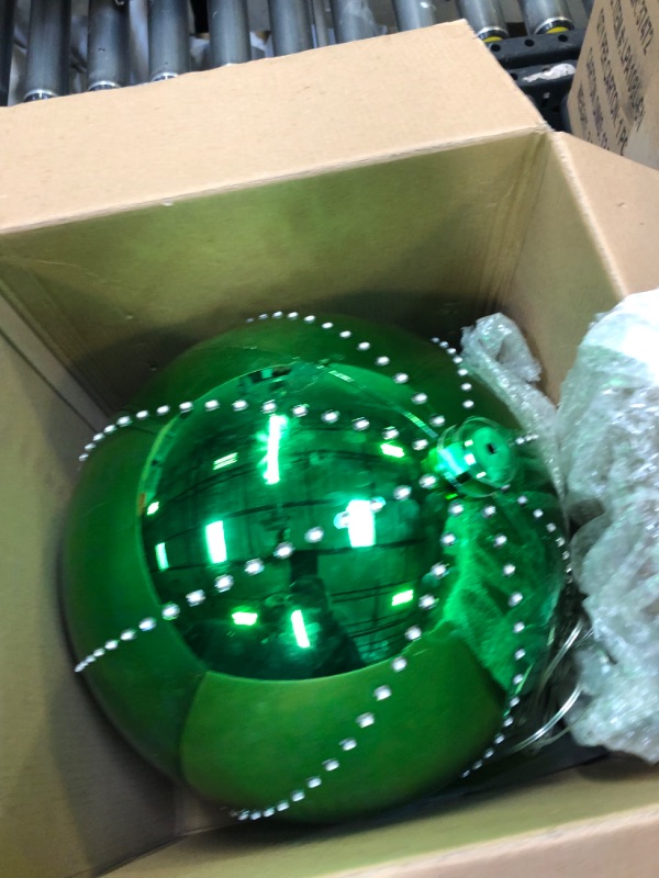 Photo 2 of Alpine Corporation 13" H Indoor Large Hanging Christmas Ball Ornament Decoration with Chasing LED Lights, Green