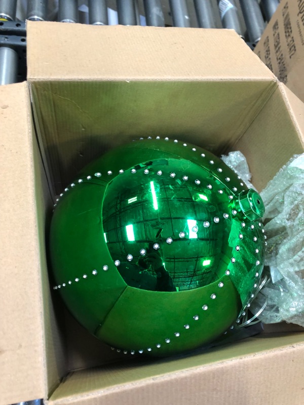 Photo 3 of Alpine Corporation 13" H Indoor Large Hanging Christmas Ball Ornament Decoration with Chasing LED Lights, Green