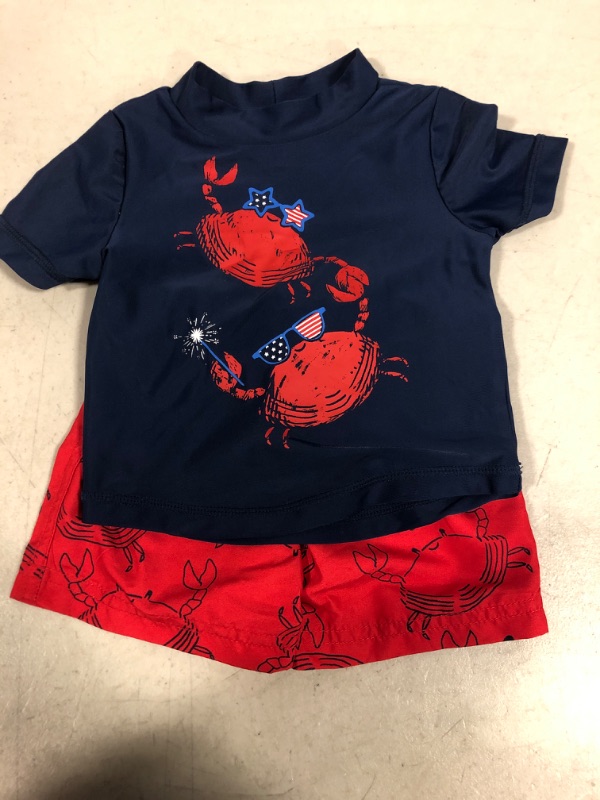 Photo 2 of Carter's Just One You® Baby Boys' 2pc Short Sleeve Crab Print Rash Guard Set - Red/White/Blue, SIZE 6M 