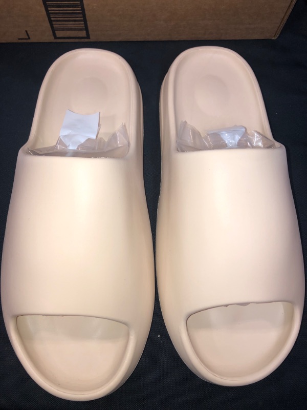 Photo 1 of creme colored slides
Size 11 1/2