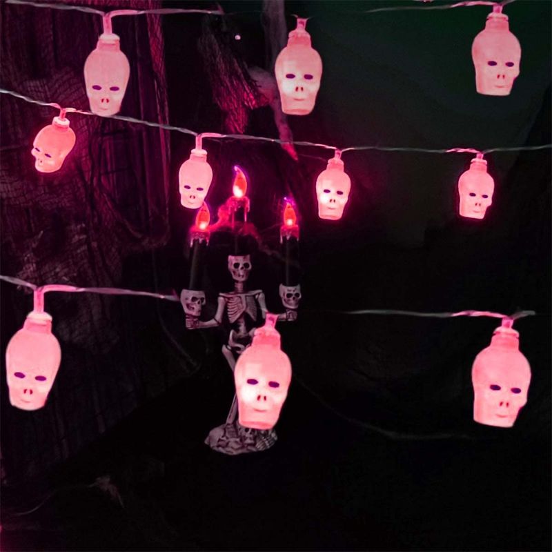 Photo 1 of 2 COUNT OF OAYGNEH Halloween Decorations 20LED Skull Lights Indoor Halloween Room Decor, Mini Halloween Lights Battery Operated Spooky Horror Halloween Atmosphere Decor for Party Room Patio Yard (Red)
