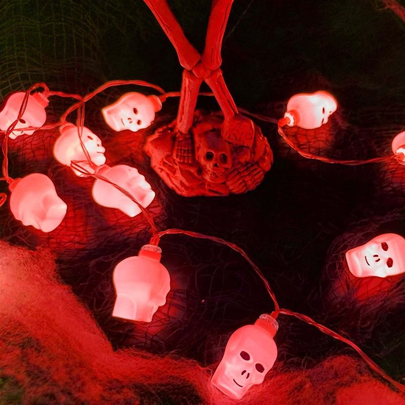 Photo 1 of 2 COUNT OF OAYGNEH Halloween Decorations 20LED Skull Lights Indoor Halloween Room Decor, Mini Halloween Lights Battery Operated Spooky Horror Halloween Atmosphere Decor for Party Room Patio Yard (Red)
