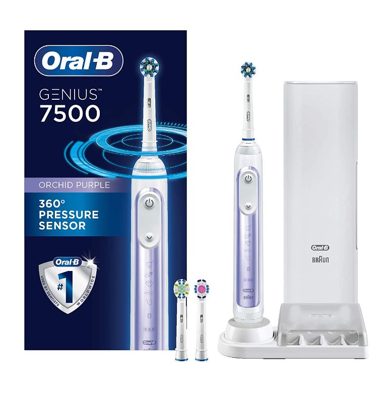 Photo 1 of Oral-B 7500 Electric Toothbrush with Replacement Brush Heads and Travel Case, Orchid Purple ( USED ITEM )
