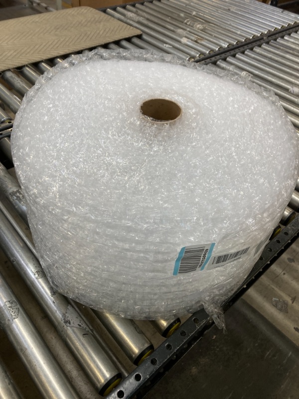 Photo 2 of Amazon Basics Perforated Bubble Cushioning Wrap - Medium 5/16", 12-Inch x 100-Foot Long Roll