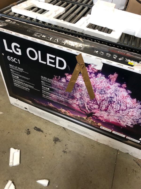 Photo 2 of LG C1 Series 65-Inch Class OLED Smart TV OLED65C1PUB, 2021 - 4K TV, Alexa Built-in 65 inch TV Only--------TV is new but has a minor dent on the screen due to transit 