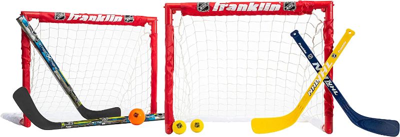 Photo 1 of Franklin Sports - NHL Kids Folding Hockey Goals Set - (2) Street Hockey & Knee Hockey Goals - (2) Adjustable Youth Hockey Sticks, (2) Knee Hockey Sticks, (2) Mini Hockey Balls + (1) Street Hockey Ball
