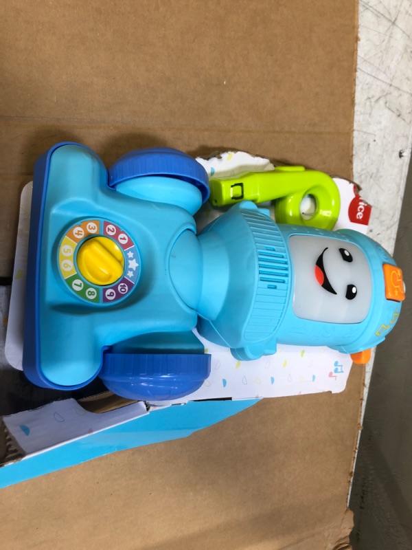 Photo 2 of Fisher-Price Laugh & Learn Toddler Toy Vacuum, Push Toy with Lights Music and Educational Songs, Light-Up Learning