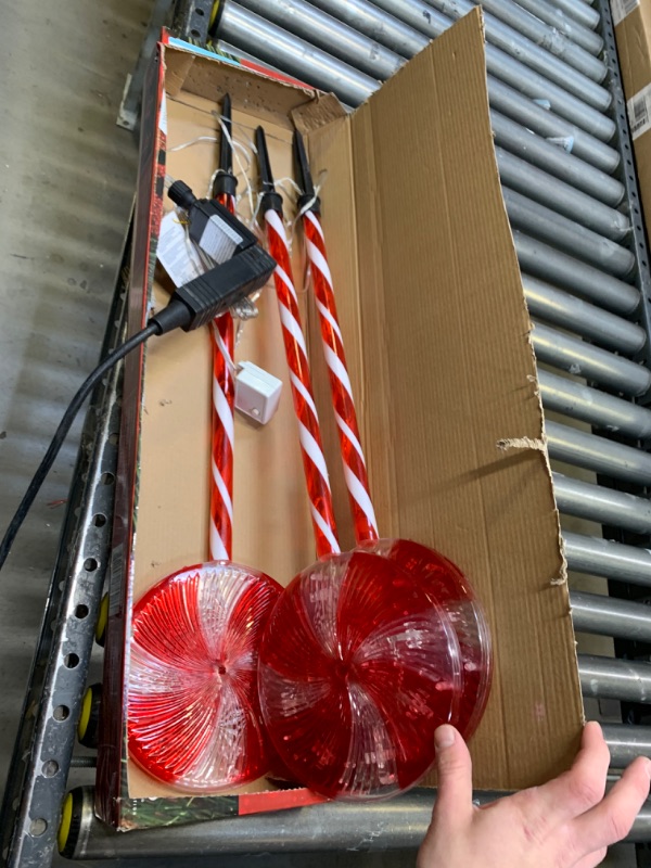 Photo 3 of Alpine Corporation 28" H Outdoor Candy Cane Yard Stakes with Red and White LED Lights (Set of 3), Lights did Not Turn on, Moderate Use