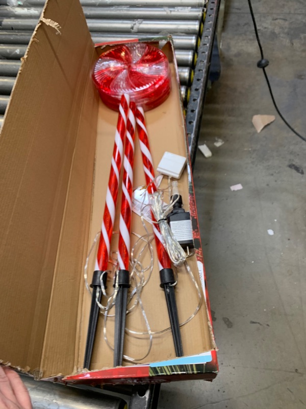 Photo 4 of Alpine Corporation 28" H Outdoor Candy Cane Yard Stakes with Red and White LED Lights (Set of 3), Lights did Not Turn on, Moderate Use