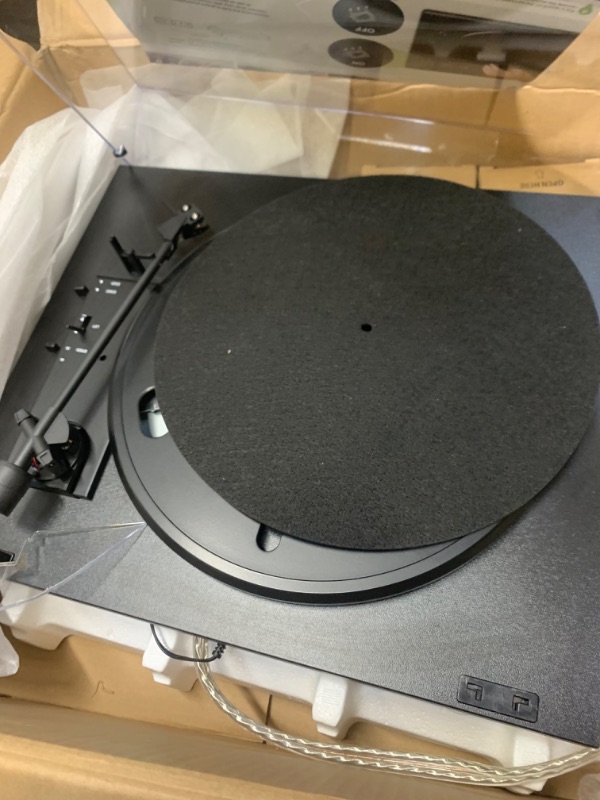 Photo 5 of Pro-Ject Automat A1, Fully Automatic Turntable System with pre-Adjusted OM 10 Cartridge and Built-in switchable Moving Magnet (MM) Phono Stage, Black --- Selling for Parts, Item Did Not Turn On, Missing Parts, Box Packaging Damaged
