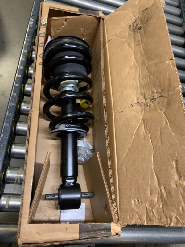 Photo 3 of Monroe Shocks & Struts Quick-Strut 139105 Strut and Coil Spring Assembly, Selling for Parts