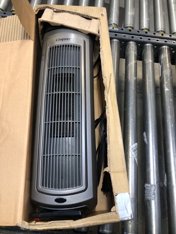 Photo 1 of Lasko 1500W Digital Ceramic Space Heater with Remote, 755320, Silver