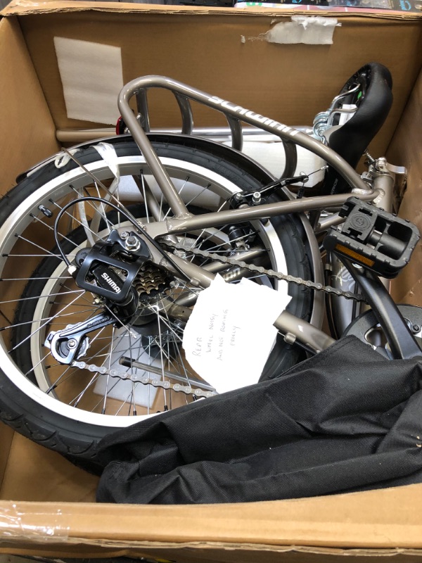 Photo 1 of Schwinn Loop Adult Folding Bike, 20-inch Wheels, 7-Speed Drivetrain, Rear Carry Rack, Carrying Bag, Multiple Colors Silver adult 7-speed