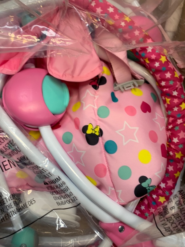 Photo 4 of Bright Starts Disney Baby Infant to Toddler Rocker with Soothing Vibrations, Minnie Mouse Stars & Smiles, Ages Newborn + Minnie Stars & Smiles --- Box Packaging Damaged, Item is New
