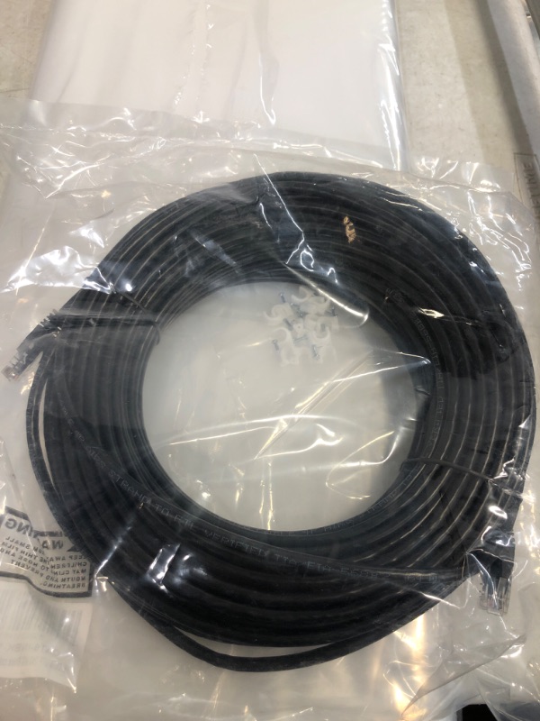 Photo 2 of Cat6 Ethernet Cable with Clips by QNECS- 550 Mhz Ethernet Network Cable- Snagless High Speed Patch Internet Computer Cord- UTP CAT 6 Cable with RJ45 Connector for Home Office Servers [Black - 100 Ft] 100 Ft Black