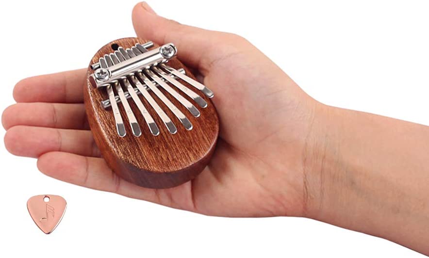 Photo 1 of Alnicov 8 Key Mini Kalimba Finger Thumb Piano for Musical Gift
