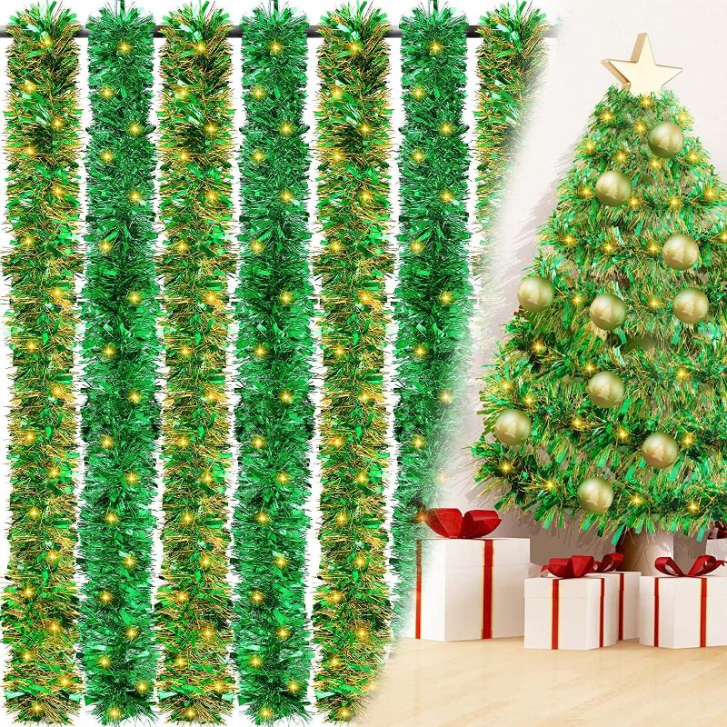 Photo 1 of 157.44 ft Christmas Green Foil Tinsel Garland Metallic Tinsel Twist Garland Green Christmas Tree Topper Decorations with 12 Pcs LED Lights and Other Accessories for Xmas Tree Outdoor Indoor Bedroom
