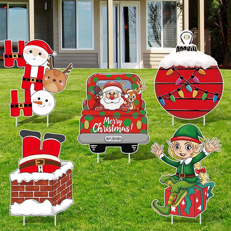 Photo 1 of 5 Pieces Large Christmas Yard Sign Stakes Outdoor Decoration Xmas Holiday Winter Lawn Decorations Elf, Christmas Ball, Santa Claus, HOHOHO, Elk, Snowman Garden Sign Christmas Lawn Sign 15 x 13 inches
