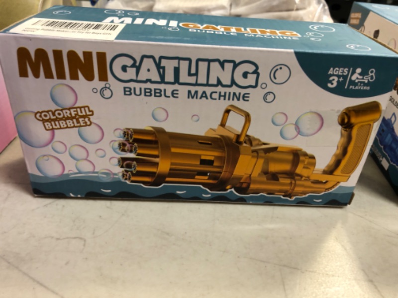 Photo 1 of Electric Bubble Gun, Bubble Maker Bubble Machine W/ 100ML Bubble Solution 2022 Upgrade 8-Hole Bubble Blower Automatic Bubble Machine Outdoor Toy for Boys Girls Black------FACTORY SEALED
