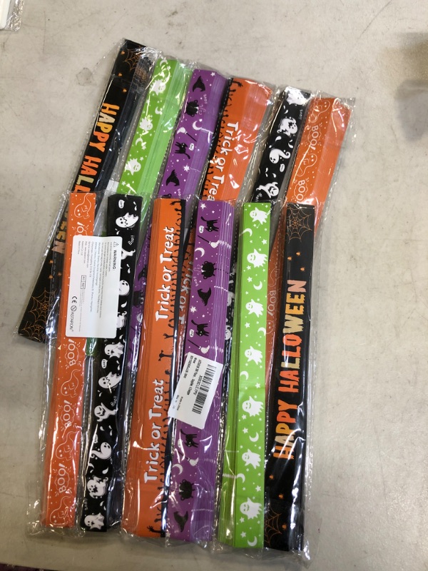 Photo 2 of ASTARON 300 Pieces Halloween Paper Wristbands 3/4 inch Halloween Theme Paper Bracelets for Haunted House Party Ghost Party Supplies, 6 Designs