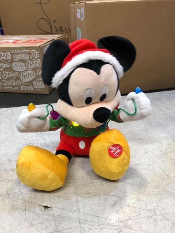 Photo 2 of Disney Holiday Mickey Mouse 9-inch Feature Plush Stuffed Animal with Lights and Sounds, Officially Licensed Kids Toys for Ages 3 Up, Gifts and Presents Lights and Sounds Mickey Plush