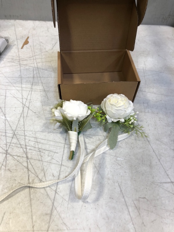 Photo 1 of  IVORY CORSAGE AND MEN BOUTONNIERE SET 