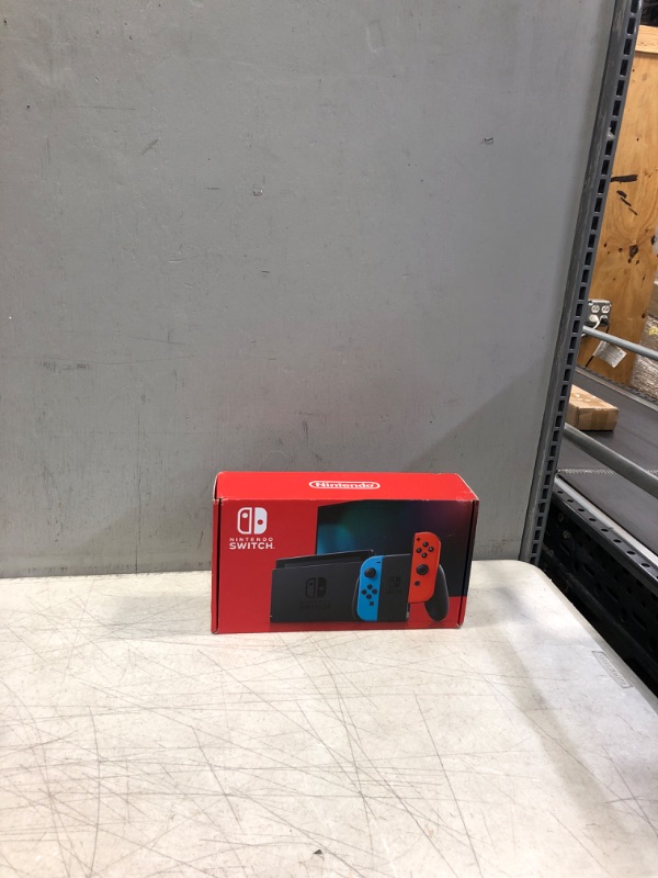Photo 2 of Nintendo Switch with Neon Blue and Neon Red Joy?Con