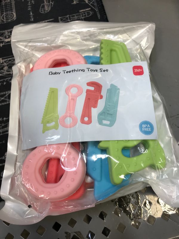 Photo 2 of 4Pack Teething Toys for Babies 0-6 Months with Lanyard, Baby Infant Teething Toys for Molars 6-12 Months, Freezer Safe Soft Silicone Baby Molar Teether Chew Toys Wrench Pliers Shape