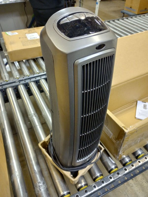 Photo 3 of Lasko 1500W Digital Ceramic Space Heater with Remote, 755320, Silver ---- minor used, dirty from previous used, turns on as shown in pictures