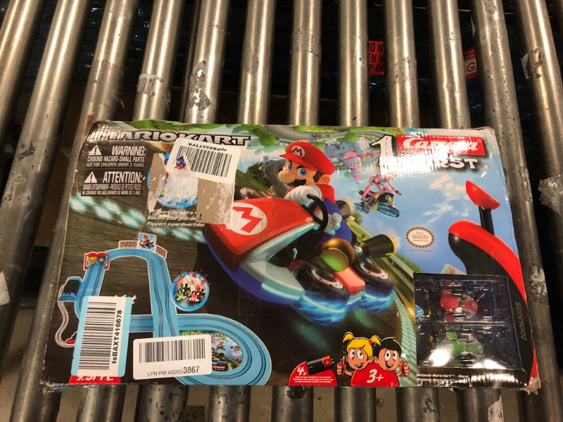 Photo 2 of Carrera First Nintendo Mario Kart Slot Car Race Track - Includes 2 Cars: Mario and Luigi and Two-Controllers - Battery-Powered Beginner Set for Kids Ages 3 Years and Up, 20063028 Mario Kart / Flippers