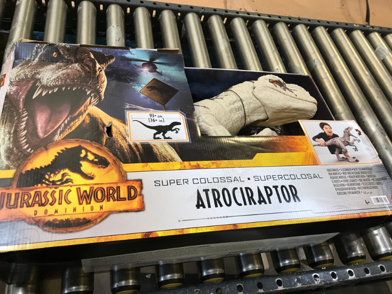 Photo 2 of Jurassic World Dominion Large Dinsoaur Toy, Super Colossal Atrociraptor Action Figure 3 Feet Long with Eating Feature, Gift for Kids [Amazon Exclusive] Dinosaur Toy