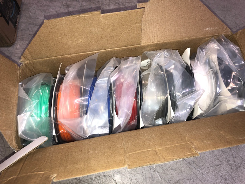 Photo 2 of SUNLU 250g PLA Filament 1.75mm, 3D Printer Filament, Dimensional Accuracy +/- 0.02 mm, 0.25 kg Spool, 8 Rolls, Black+White+Grey+Transparent+Red+Blue+Orange+Green 8 Spool (Black+white+grey+transparent+red+blue+orange+green)