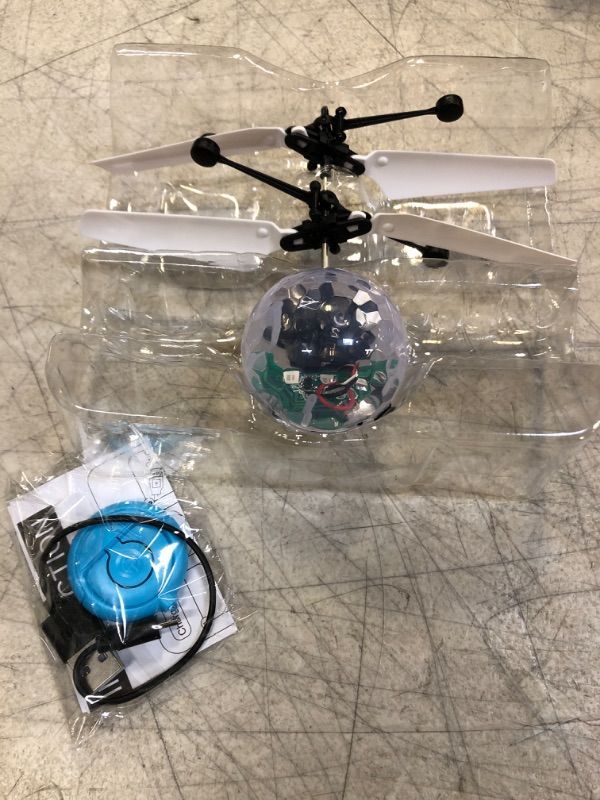 Photo 2 of Flying Toy Ball Infrared Induction RC Flying Toy Built-in LED Light Disco Helicopter Shining Colorful Flying Drone Indoor and Outdoor Games Toys for 3 4 5 6 7 8 9 10 Year Old Boys and Girls