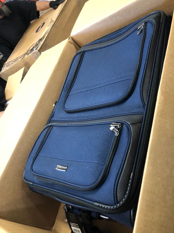 Photo 1 of Traveler's Choice Conventional II Softside Expandable Rugged Rolling Upright Suitcase, Lightweight Travel Luggage, Navy, Checked-Large 30-Inch Checked-Large 30-Inch Navy