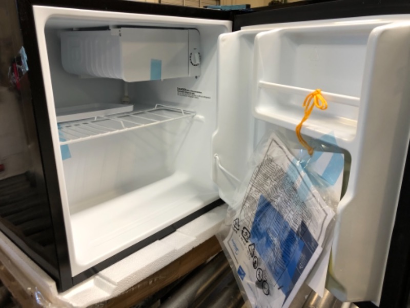 Photo 2 of Midea WHS-65LB1 Compact Single Reversible Door Refrigerator, *markings/dirty exterior* 1.6 Cubic Feet(0.045 Cubic Meter), Black Black 1.6 Cubic Feet Refrigerator