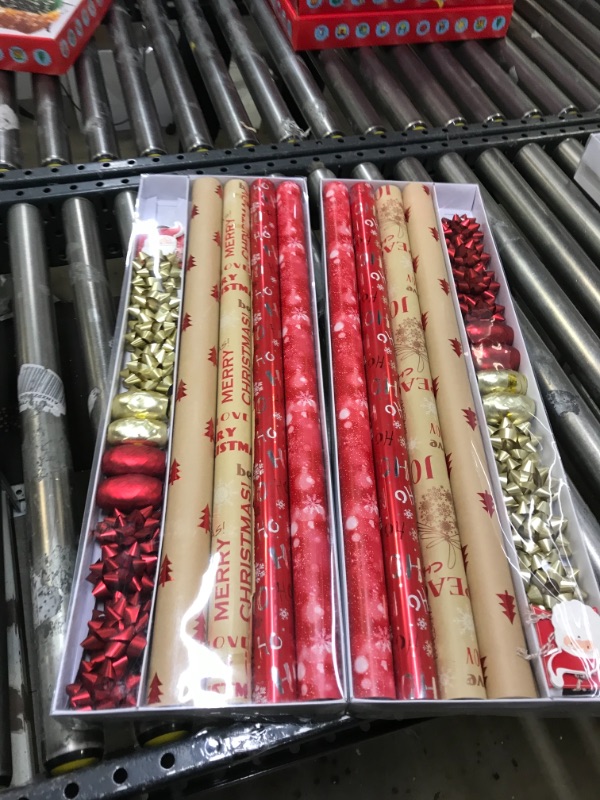 Photo 2 of 2 PK Wrapping Paper, 4 Rolls of Red Christmas Birthday Wrapping Paper. Includes Christmas Tree, Snowflake, Merry Christmas, HO HO HO Elements. Includes Decorative Flowers, Ribbons, Labels. Each Roll of Gift Wrap Paper ,easures 27.5 In X 13 ft