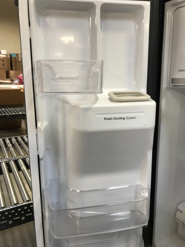 Photo 7 of 25.5 CU. FT. FRENCH DOOR REFRIGERATOR WITH ICE & WATER DISPENSER - BLACK

This Winia 25.5 cu. ft. French Door refrigerator is beautifully designed with a Filtered Ice & Water Dispenser and a Fingerprint Resistant Finish that holds magnets. The fridge is l