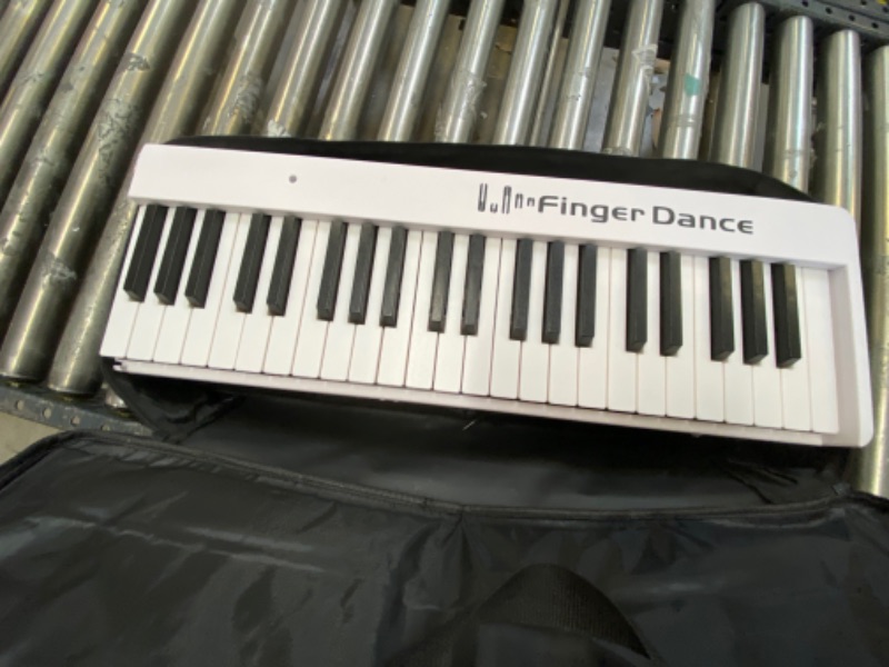 Photo 3 of FINGER DANCE FOLDABLE KEYBOARD