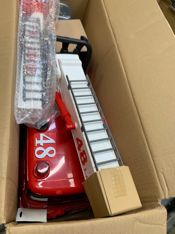 Photo 1 of SKYTEAM Action Fire Engine Ride-On --- Box Packaging Damaged, Item is New
