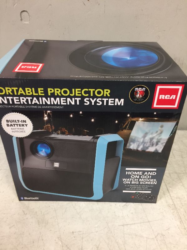 Photo 2 of RCA - RPJ060 Portable Projector Home Theater Entertainment System, Long Lasting Battery - 2.5 Hours per Charge - Outdoor, Rechargeable, Speakers - Enjoy Without Any Cable on The go - Phone/Stick/PC Black/Blue --factory sealed --